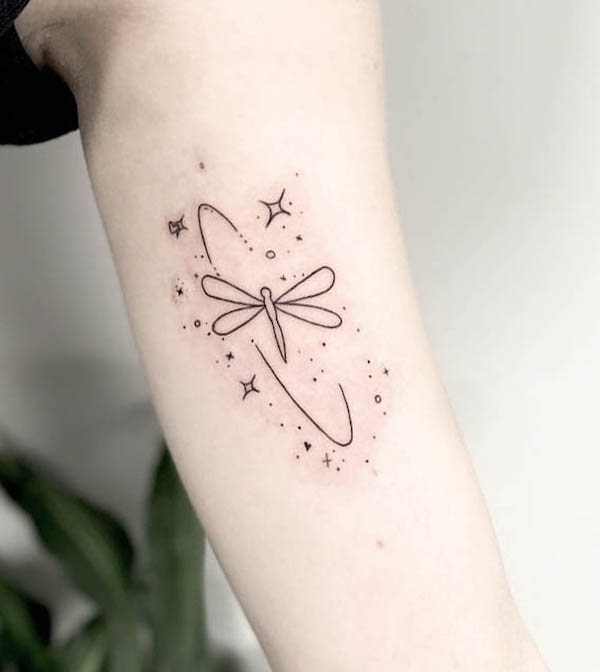 Cute fine line dragonfly tattoo by @everlie.ink