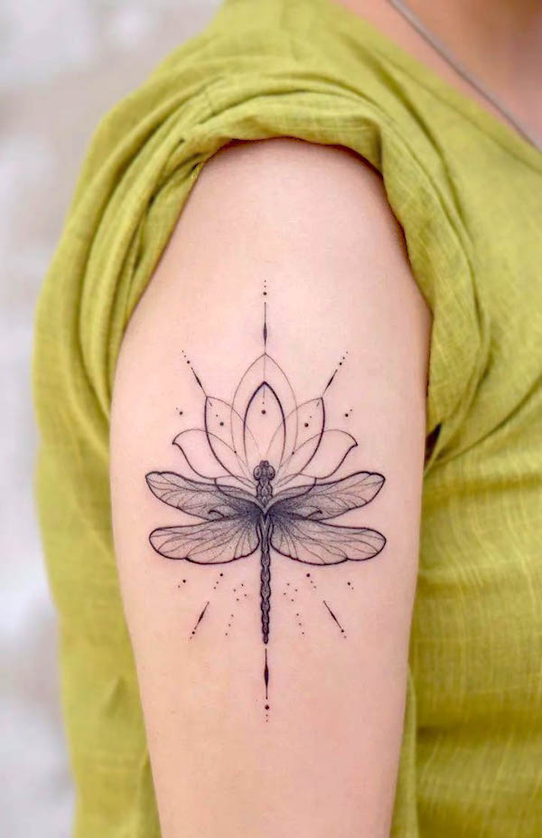 Lotus dragonfly tattoo by @devilztattooz